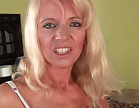 Sultry senior mom probes her old pussy with a large dildo