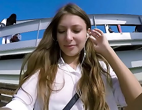Talia mint plays alongside public with remote control toy over along to phone with follower