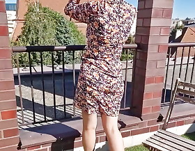 Wanilianna in her summer dress and seamed nylon stockings is teasing you on the roof top