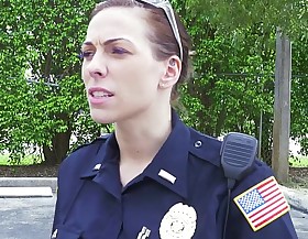 Female cops be over black suspect together with suck his cock