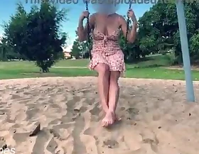 Wife rides the swing at the park with no panties public madcap