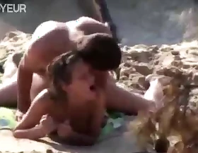 Beach Voyeur. Very sexy teen babe just hammered into the beach sand