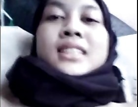 Beautiful hijaber shakes her smooth pussy because she's already horny